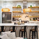 Shimmering New Nola Home Tvs In Bedrooms & Parking