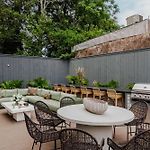 Lush Garden District Suite & Shared Outdoor Space