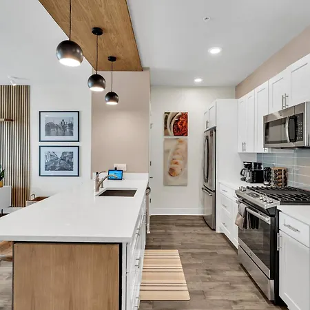 Pool & Gym Retreat Steps From Crescent Park Apartment *